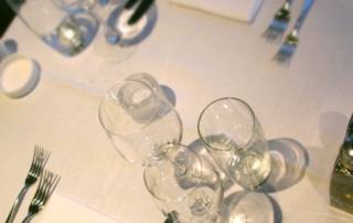 Restaurant table with place settings for two.