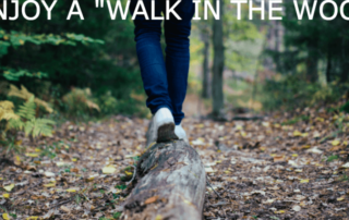 Person walking on a log. Text: Enjoy a "Walk in the Woods."