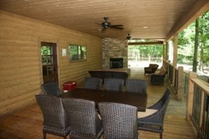 Outdoor deck with dining table.