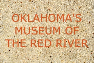 A title board reading: Oklahoma's Museum of the Red River.