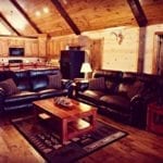 Sitting area of the great room, showcasing the cushy leather chairs.