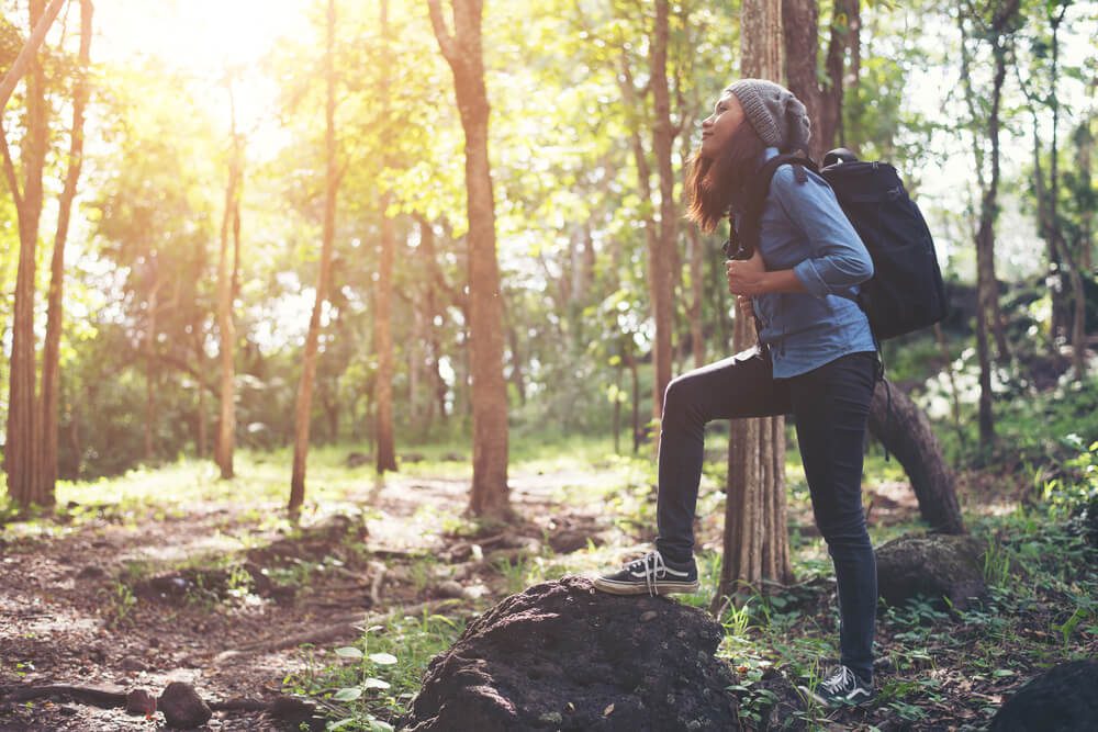 A woman exploring hiking trails in McCurtain County, Oklahoma.