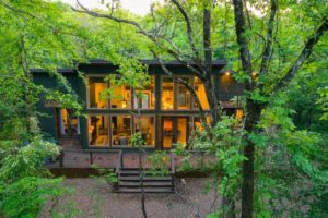 Enjoy a relaxing cabin rental in the woods that puts you near the best things to do in Hochatown.
