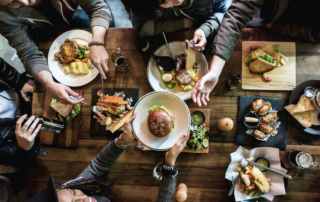 A group eating at one of the top Broken Bow restaurants.