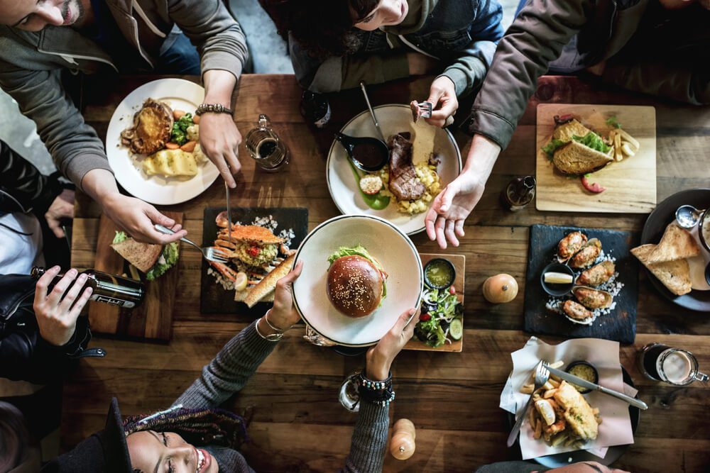 A group eating at one of the top Broken Bow restaurants.