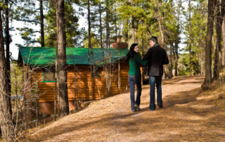 A couple walking back to one the top romantic cabins in Broken Bow.