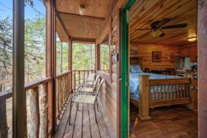 The porch and bedroom at a cabin near Little River National Wildlife Refuge.