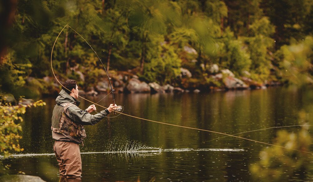 A man trout fishing in Broken Bow.