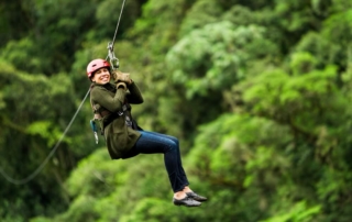 A photo of a woman ziplining in Broken Bow.