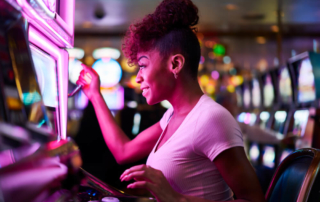 A woman at a slot machine at the casino in Broken Bow.