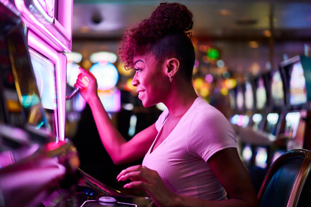 A woman at a slot machine at the casino in Broken Bow.