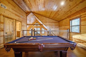 The game room of a cabin rental, one of the top places to stay in Broken Bow, OK.