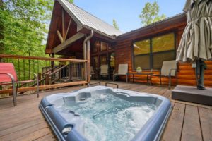 A Broken Bow cabin rental hot tub to relax in after fishing on the lake.