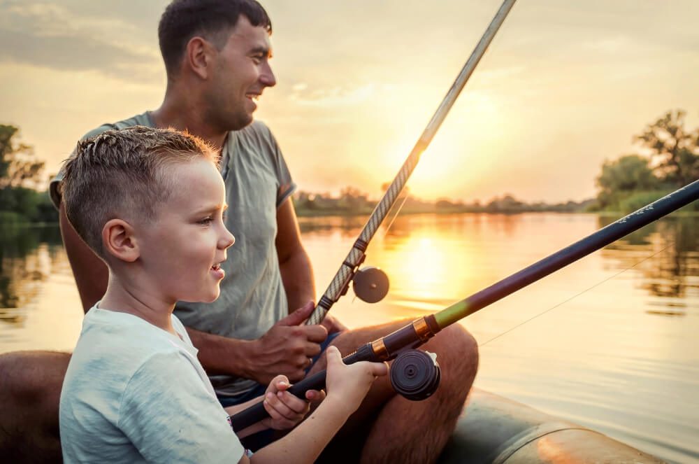 A father and son fishing on Broken Bow Lake.