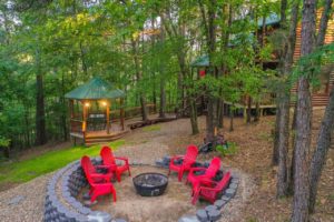 The firepit area of a Broken Bow cabin to research local outdoor activities.