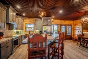 The kitchen of a Hochatown cabin to cook a meal in using ingredients from a Broken Bow grocery store.