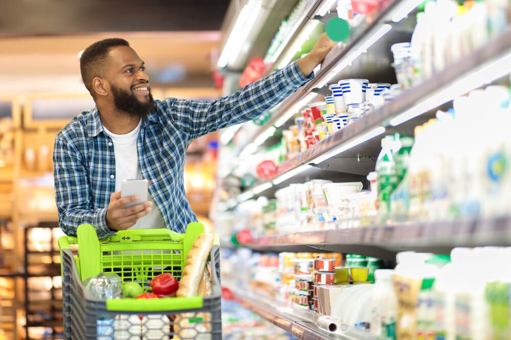 A man shopping at a Broken Bow grocery store.