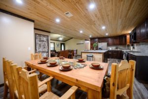 The dining area of a Hochatown cabin rental to enjoy take-out from local restaurants in.