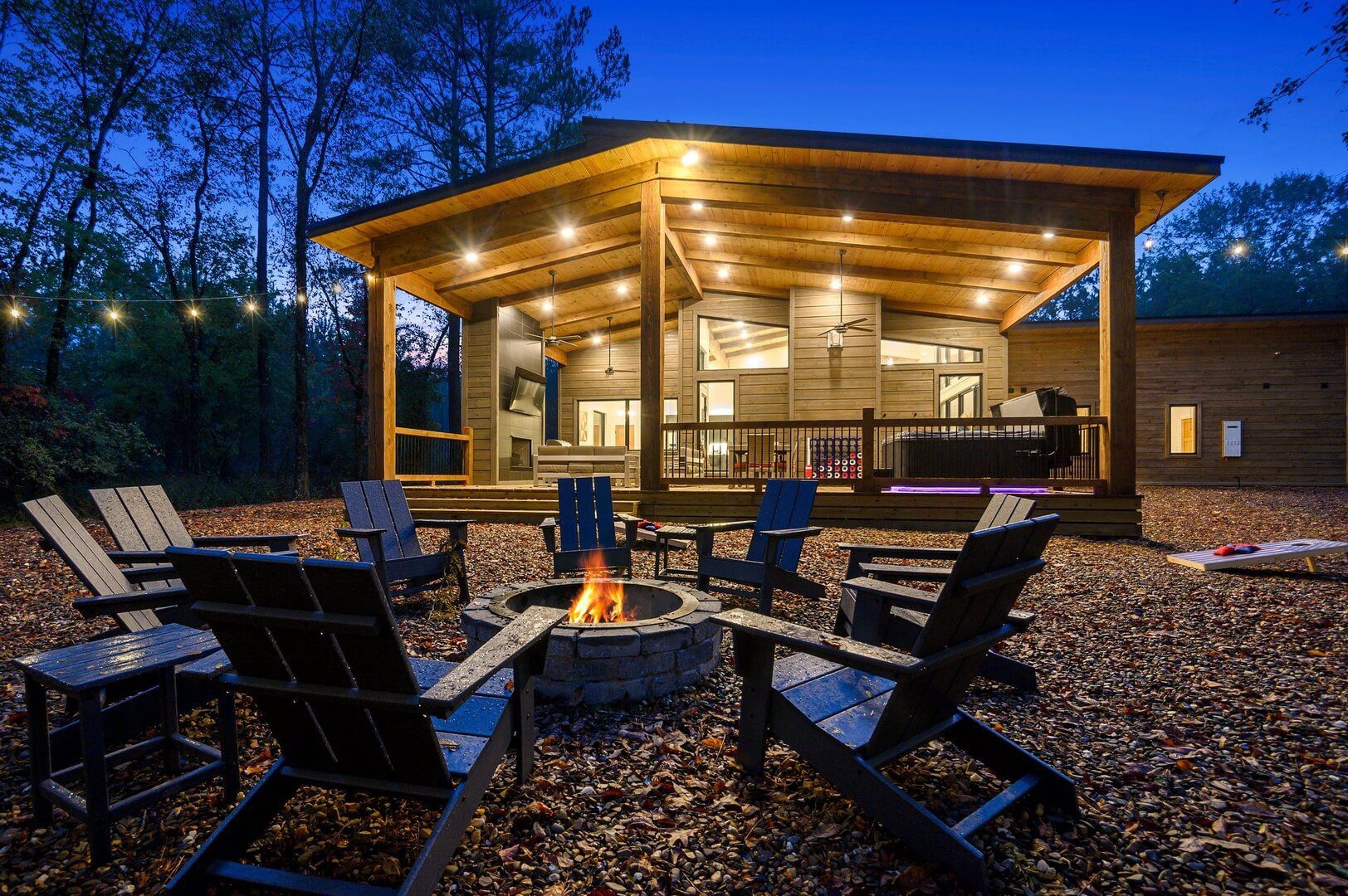 The backyard area, complete with fire pit, of one of the top Hochatown cabin rentals.