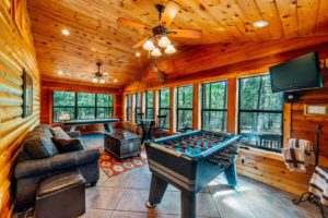 The game room at a Hochatown cabin to hang out in when looking for indoor things to do.