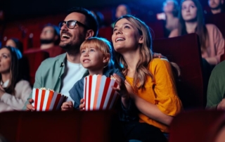 A family watching a movie, one of the best things to do in Hochatown on a gloomy day.