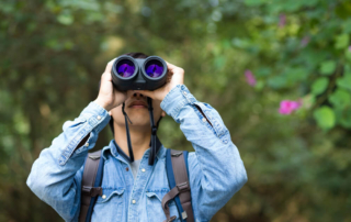 A woman looking for birds in Oklahoma.