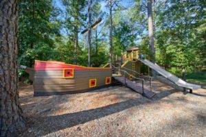The playground at a cabin in Hochatown close to popular things to do with kids.