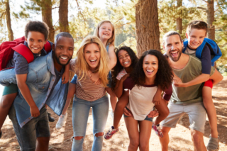A large group hiking on an Oklahoma vacation in Hochatown.