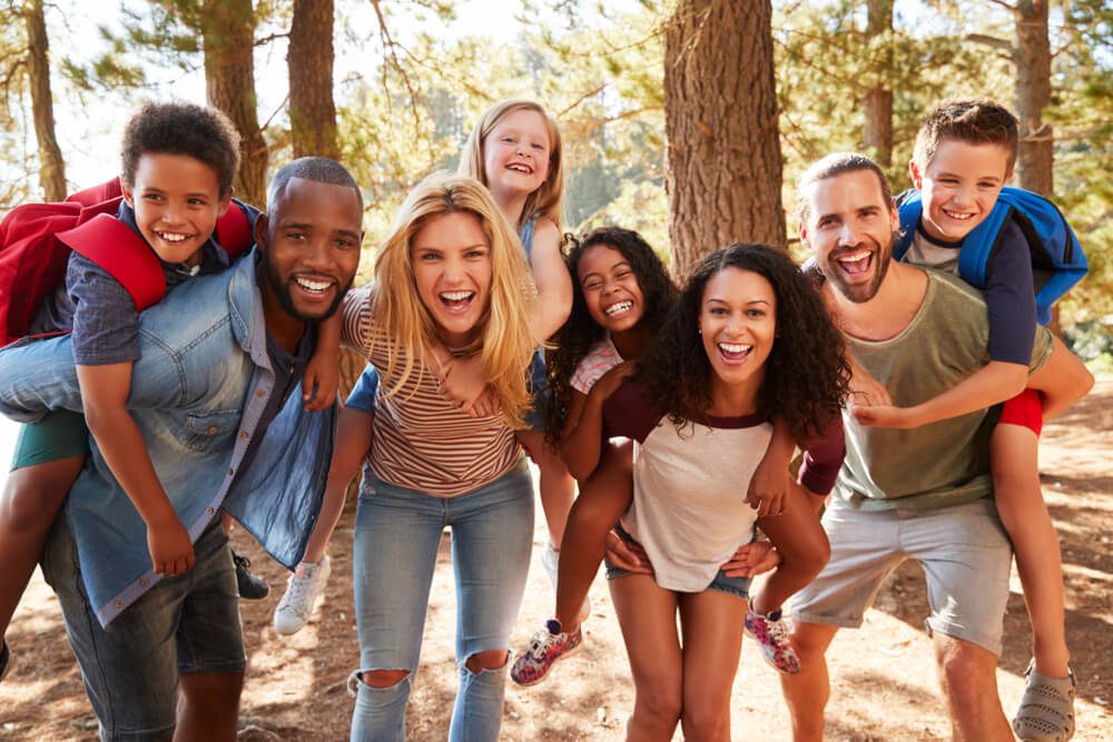 A large group hiking on an Oklahoma vacation in Hochatown.