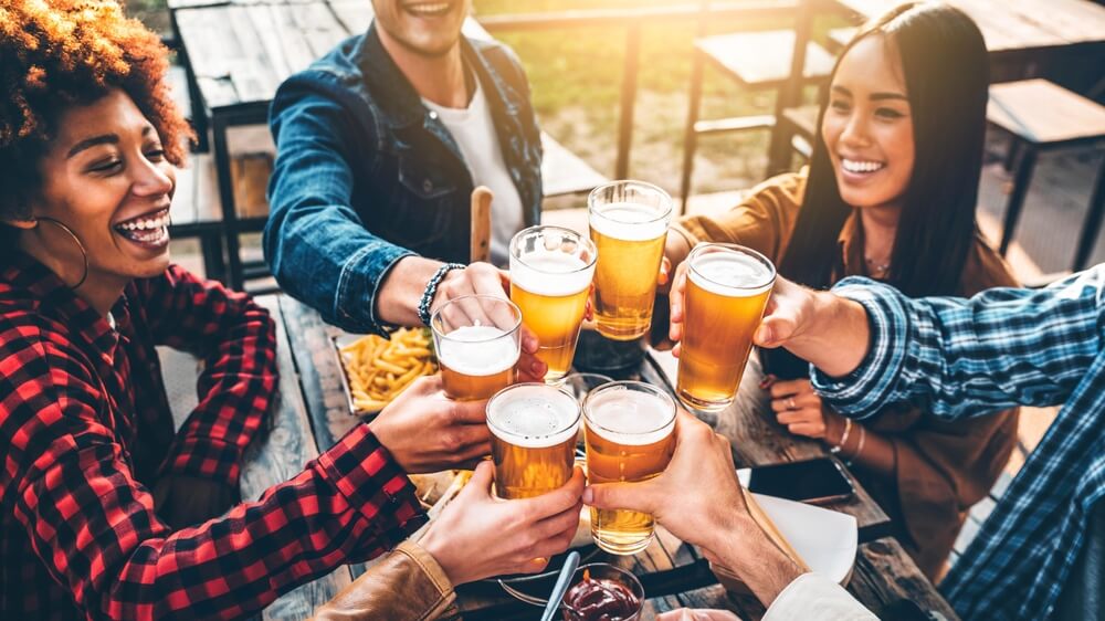 A group of people at a brewery, one of the best things to do in Hochatown for adults.