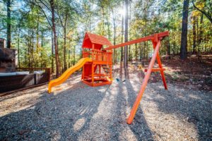 A playset at an Oklahoma cabin rental in Hochatown.