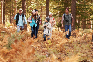 A family hiking on one of their vacations in Hochatown, Oklahoma.