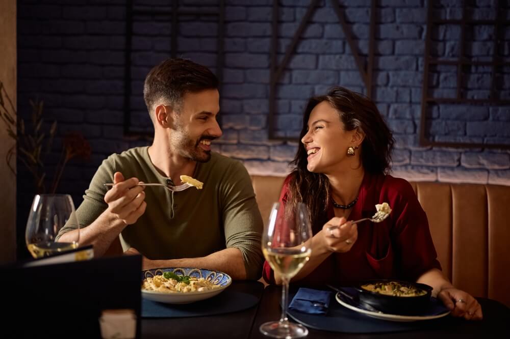 A couple out to dinner at one of the romantic restaurants in Hochatown.