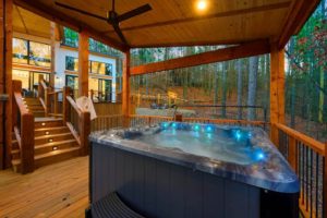 A hot tub at a Hochatown cabin, which is a top vacation destination in Oklahoma.
